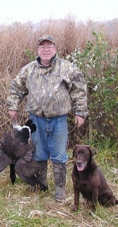 Dr. Jack Scanlon with his retriever